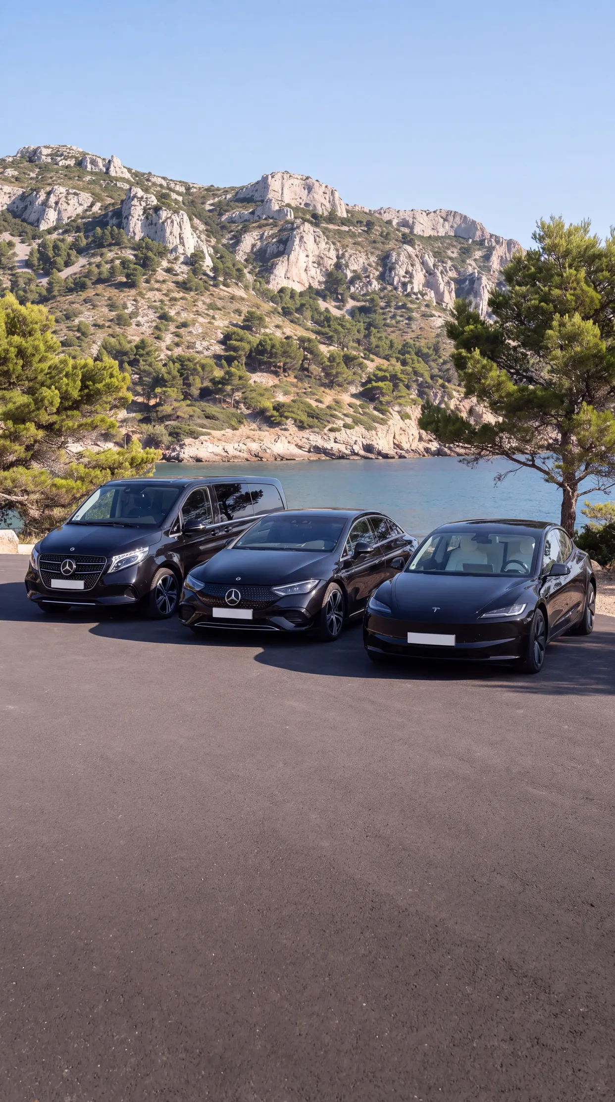 Yago VTC's Tesla, Mercedes EQE and Mercedes people carrier on a coastal road